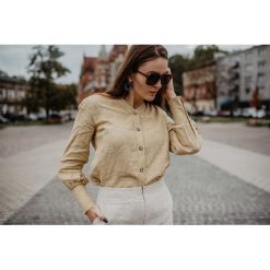 Lniana koszula w kratkę z bufiastymi rękawami. Koszule damskie Yanowska, w kratkę, z tkaniny, bez kołnierzyka, z długim rękawem. Za 359,00 zł.