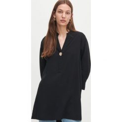 Długa bluzka oversize - Czarny. Czarne bluzki damskie Reserved, bez wzorów, bez kołnierzyka, z długim rękawem. Za 119,99 zł.