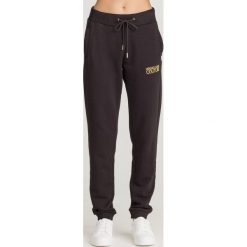 SPODNIE Versace Jeans Couture. Czarne spodnie damskie Versace Jeans Couture, xl, z jeansu. Za 439,45 zł.