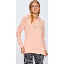 Adidas Performance - Bluza. Pomarańczowe bluzy damskie z kieszeniami marki adidas Performance, s, z nadrukiem, z bawełny, z kapturem. W wyprzedaży za 179,90 zł.