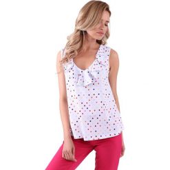 Top w kolorze kremowym ze wzorem. Białe bluzki damskie Modne letnie stylizacje, xs, bez wzorów, bez kołnierzyka, bez rękawów. W wyprzedaży za 99,95 zł.