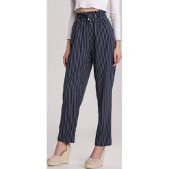 Granatowe Spodnie Callagune. Niebieskie spodnie damskie Renee, xl, z tkaniny. W wyprzedaży za 59,99 zł.