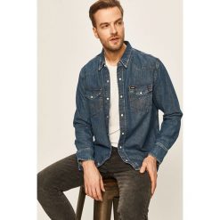 Wrangler - Koszula. Niebieskie koszule męskie Wrangler, s, bez wzorów, z bawełny, klasyczne, z klasycznym kołnierzykiem, z długim rękawem. W wyprzedaży za 229,90 zł.