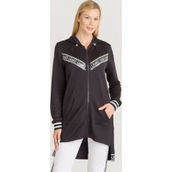 BLUZA LIU JO SPORT. Czarne bluzy sportowe damskie Liu Jo Sport, s, bez wzorów, z materiału, bez rękawów, bez kaptura. Za 699,00 zł.