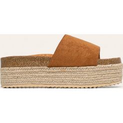 Answear - Klapki Woman Key. Żółte klapki damskie ANSWEAR, bez wzorów, z gumy, bez obcasa, na obcasie. W wyprzedaży za 79,90 zł.