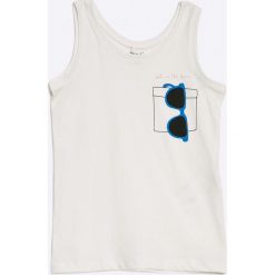 Name it - Top dziecięcy 122-158. Szare topy damskie marki Name it, z nadrukiem, z bawełny, z okrągłym kołnierzem. W wyprzedaży za 29,90 zł.