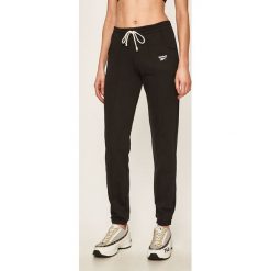 Reebok - Spodnie. Czarne spodnie damskie Reebok, s, bez wzorów, z bawełny. Za 169,90 zł.