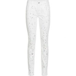 Spodnie SKINNY w kolorowe kleksy bonprix biało-kolorowy. Białe rurki damskie marki bonprix, w kolorowe wzory. Za 54,99 zł.
