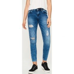 Odzież damska: Jeansy skinny z przetarciami - Granatowy