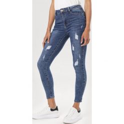 Niebieskie Jeansy Slim Corixera. Niebieskie jeansy damskie Born2be. Za 99,99 zł.