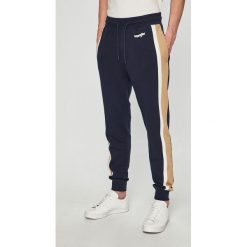 Wrangler - Spodnie. Niebieskie spodnie męskie Wrangler, na co dzień, s, bez wzorów, z bawełny, casualowe. Za 289,90 zł.