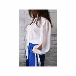 BIAŁA BLUZKA MGIEŁKA Z ROZCIĘCIEM NA RĘKAWIE. Białe bluzki damskie marki Bien fashion, xl, bez wzorów, z okrągłym kołnierzem, bez rękawów. Za 79,00 zł.