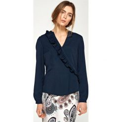 Bluzka z asymetrycznymi falbanami - granat. Bluzki damskie NIFE, xl, bez wzorów, z poliesteru, eleganckie, z asymetrycznym kołnierzem, z długim rękawem. Za 139,00 zł.