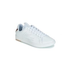 Buty Lacoste CARNABY EVO LIGHT-WT 119 3. Białe trampki i tenisówki damskie Lacoste, bez wzorów, bez zapięcia. Za 343,20 zł.