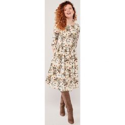 Sukienka Melania Cremona 38. Białe sukienki damskie s, w kwiaty, z elastanu, bez kołnierzyka, bez rękawów, rozkloszowane. Za 397,00 zł.