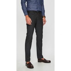 Pierre Cardin - Spodnie Lyon. Czarne spodnie męskie marki Pierre Cardin, na co dzień, bez wzorów, z elastanu, casualowe. Za 429,90 zł.