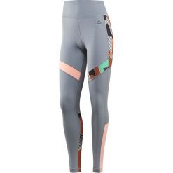 Legginsy do biegania damskie REEBOK RUNNING ESSENTIALS TIGHT / BQ7463 - REEBOK RUNNING ESSENTIALS TIGHT. Niebieskie spodnie damskie Reebok, z nadrukiem, do biegania. Za 139,00 zł.