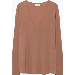 Sweter "Bloosom" w kolorze cielistym. Pomarańczowe swetry damskie American Vintage, s, bez wzorów, z wełny, bez rękawów, bez kaptura. W wyprzedaży za 155,95 zł.