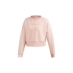 Bluzy adidas Krótka bluza Coeeze. Różowe bluzy damskie marki Adidas, bez wzorów, z krótkim rękawem, krótkie, bez kaptura. Za 249,00 zł.