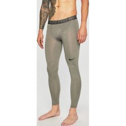 Nike - Legginsy. Szare spodnie męskie Nike, s, bez wzorów, z elastanu, sportowe. W wyprzedaży za 119,90 zł.