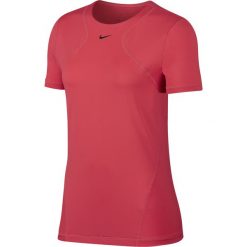 Koszulka Nike Pro All Over Mesh SS Top W Koralowa. Pomarańczowe topy damskie marki Nike, bez wzorów, z materiału, z krótkim rękawem, do biegania. Za 99,99 zł.