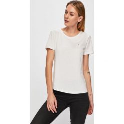 Tommy Jeans - T-shirt. Niebieskie bluzki damskie Tommy Jeans, s, bez wzorów, z bawełny, z okrągłym kołnierzem. W wyprzedaży za 99,90 zł.