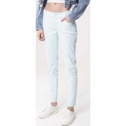 Miętowe Spodnie Homely. Zielone spodnie damskie marki Born2be, z tkaniny. Za 39,99 zł.
