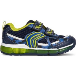 Sneakersy "Android" w kolorze granatowo-żółtym. Żółte trampki chłopięce geox kids, bez wzorów, z gumy, bez zapięcia. W wyprzedaży za 139,95 zł.