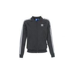 Bluzy dresowe adidas SST TT. Czarne bluzy rozpinane damskie Adidas, z dresówki. Za 239,20 zł.