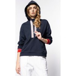Bluza TOMMY HILFIGER Raven WW0WW26677. Niebieskie bluzy damskie TOMMY HILFIGER, xs, bez wzorów, z bawełny, bez rękawów, bez kaptura. W wyprzedaży za 399,00 zł.