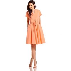 Sukienka dresowa elegancka rozkloszowana - morela, m. Sukienki damskie e-margeritka.pl, na lato, m, bez wzorów, z bawełny, eleganckie, z długim rękawem, długie, bez kaptura. Za 159,99 zł.