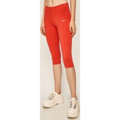 Nike Sportswear - Legginsy. Czerwone spodnie damskie Nike Sportswear, s, bez wzorów, z elastanu. Za 129,90 zł.