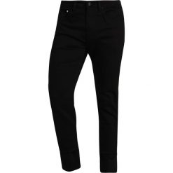 Cristiano Ronaldo CR7 Jeansy Slim Fit onyx. Czarne jeansy męskie relaxed fit marki Cristiano Ronaldo CR7. W wyprzedaży za 194,35 zł.