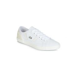 Buty Lacoste SIDELINE 119 1. Białe trampki i tenisówki damskie Lacoste, bez wzorów, bez zapięcia. Za 303,20 zł.