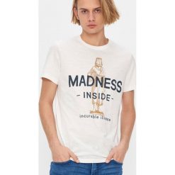 T-shirt z nadrukiem - Kremowy. Białe t-shirty męskie House, s, z nadrukiem, bez kołnierzyka. Za 39,99 zł.