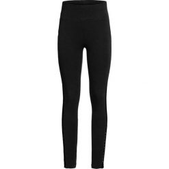 Legginsy z koronkowymi wstawkami z boku bonprix czarny. Czarne spodnie damskie bonprix, bez wzorów, z koronki. Za 54,99 zł.