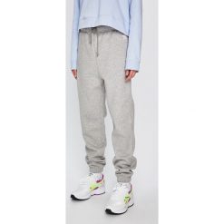 Adidas Originals - Spodnie. Szare spodnie damskie adidas Originals, bez wzorów, z bawełny, casualowe. W wyprzedaży za 199,90 zł.