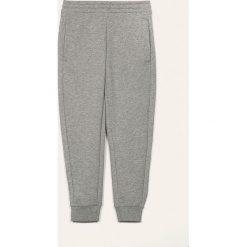 Adidas - Spodnie dziecięce 128 - 170 cm. Szare spodnie dziewczęce Adidas, z elastanu. W wyprzedaży za 79,90 zł.