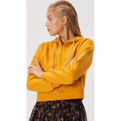 Bluza z wiązanym kapturem - Żółty. Żółte bluzy damskie Sinsay, s, bez wzorów, bez rękawów. Za 39,99 zł.