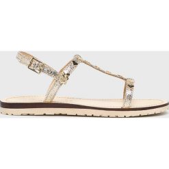Love Moschino - Sandały. Żółte klapki damskie Love Moschino, bez wzorów, ze skóry, bez obcasa, na obcasie. W wyprzedaży za 299,90 zł.