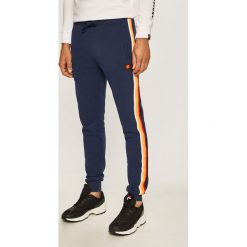 Ellesse - Spodnie. Niebieskie spodnie męskie Ellesse, na co dzień, s, bez wzorów, z bawełny, sportowe. Za 219,90 zł.