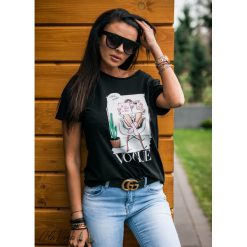 T-Shirt,,VOGUE1" czarny. Czarne bluzki damskie Divinostyle, na co dzień, s, bez wzorów, z bawełny, bez kołnierzyka, bez rękawów. Za 79,00 zł.