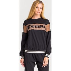 BLUZA Twinset. Czarne bluzy damskie Twinset, w koronkowe wzory, z materiału, bez rękawów, bez kaptura. Za 589,00 zł.