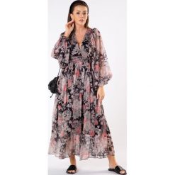 Wzorzysta sukienka maxi z bufiastymi rękawami i wiązaniem w pasie. Sukienki damskie producent niezdefiniowany, m, bez wzorów, z poliesteru, bez kołnierzyka, bez rękawów, maxi. Za 219,00 zł.
