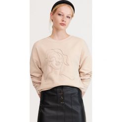 Bluza z aplikacją - Kremowy. Białe bluzy damskie Reserved, m, z aplikacjami. W wyprzedaży za 19,99 zł.