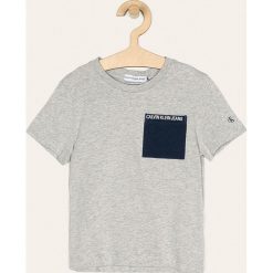 Calvin Klein Jeans - T-shirt dziecięcy 104-176 cm. Niebieskie t-shirty chłopięce Calvin Klein Jeans, z aplikacjami, z bawełny, bez rękawów. Za 119,90 zł.