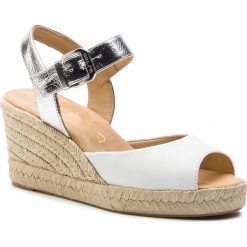 Espadryle UNISA - City Sty Mer White/Silv Softy. Białe espadryle damskie Unisa, bez wzorów, ze skóry, bez obcasa, na obcasie. W wyprzedaży za 239,00 zł.