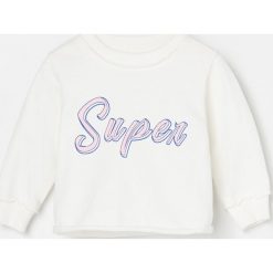 Bluza z surowym wykończeniem brzegów - Kremowy. Białe bluzy damskie Reserved, bez wzorów, bez rękawów, bez kaptura. Za 39,99 zł.