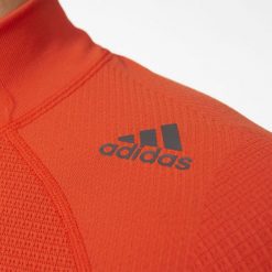 Adidas Koszulka Techfit Heat Long Sleeve Mock pomarańczowa r. M (AY3765). Pomarańczowe t-shirty męskie Adidas, m, techfit (adidas). Za 269,00 zł.