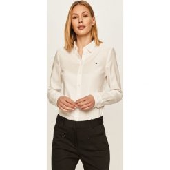 Tommy Hilfiger - Koszula. Niebieskie bluzki damskie TOMMY HILFIGER, na co dzień, m, bez wzorów, z bawełny, eleganckie, z klasycznym kołnierzykiem, z długim rękawem. Za 359,90 zł.